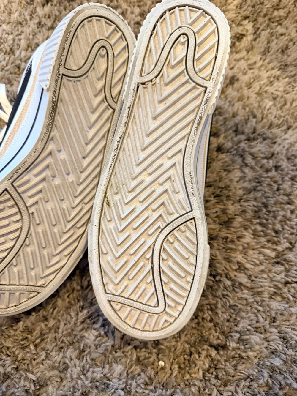 Nike women’s White Sneakers with Black Swoosh and Tan Accent court legacy style